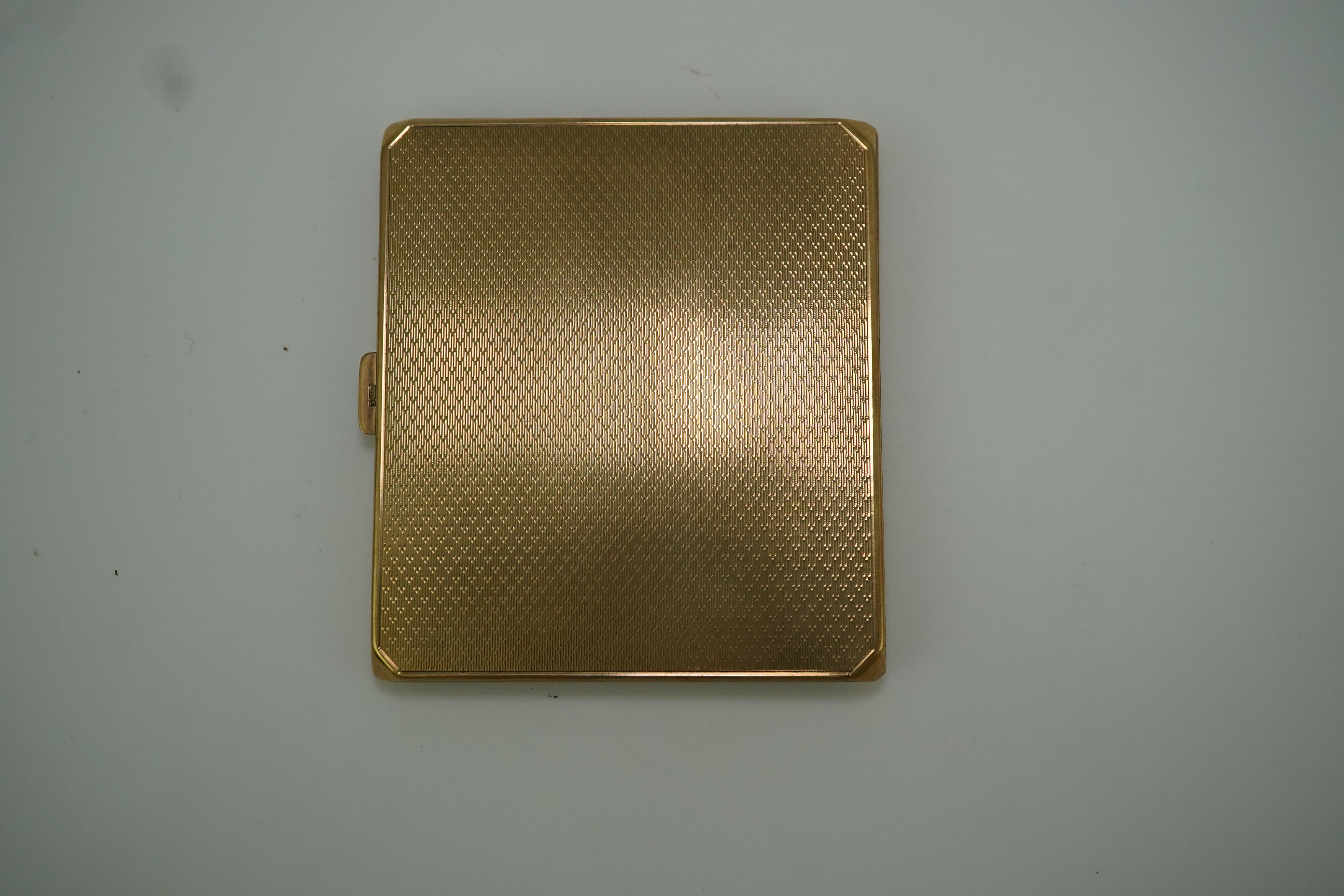 A 9ct gold cigarette case, circa 1930